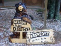 Bear Carving with Custom Sign